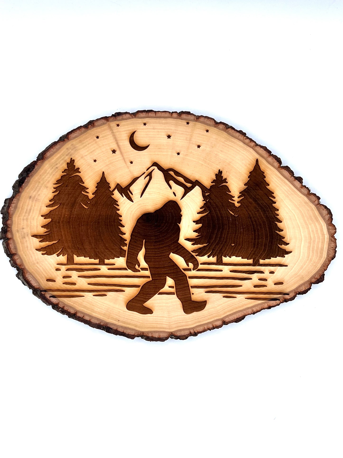 Bigfoot Sasquatch Walking in the Woods Engraved on Round Wood with Bark Edges